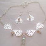 Elegant Silver & Crystal Ne..